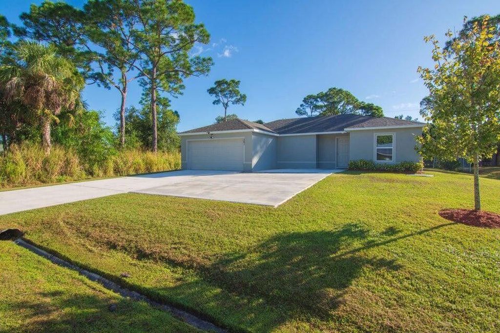 Photo of 361 NW Friar St, Port Saint Lucie, FL 34983 (MLS # R11065534)