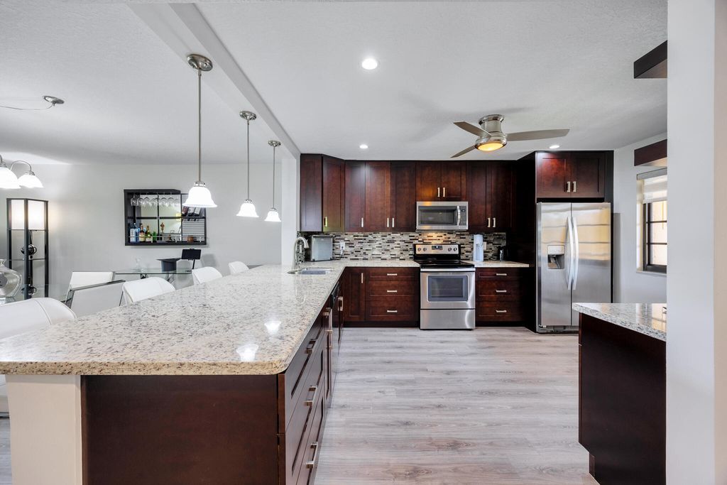 Photo of 11291 Aspen Glen Drive #202, Boynton Beach, FL 33437 (MLS # B26015095)