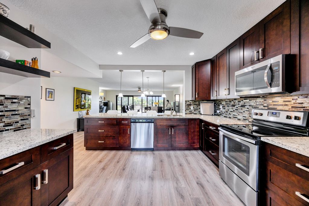 Photo of 11291 Aspen Glen Drive #202, Boynton Beach, FL 33437 (MLS # B26015095)
