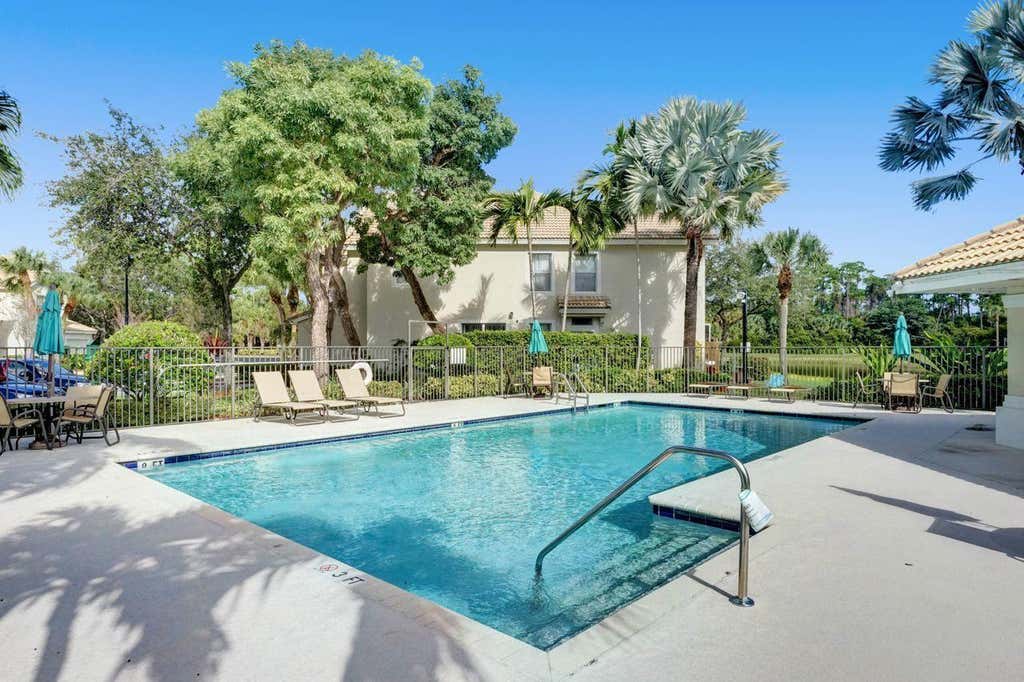 Photo of 1102 Woodfield Road, Greenacres, FL 33415 (MLS # B26062724)