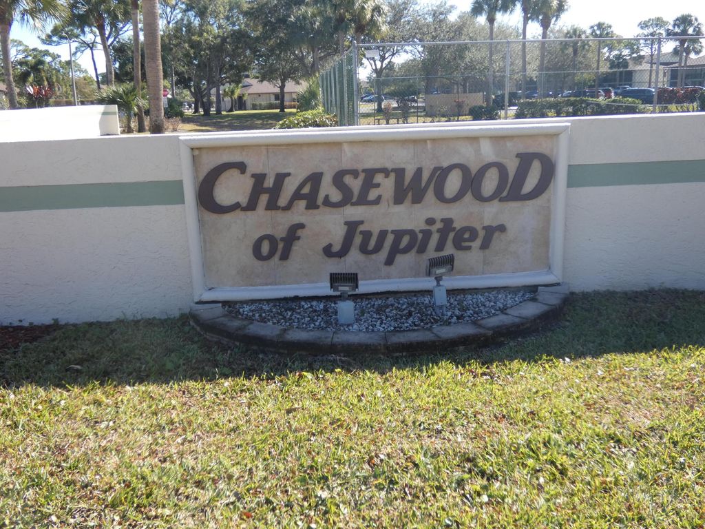 Photo of 6495 SE Chasewood Drive #E, Jupiter, FL 33458 (MLS # R11160196)