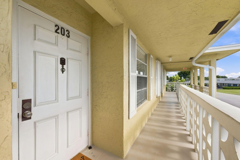 Photo of 1121 CACTUS Terrace #203, Delray Beach, FL 33445 (MLS # B26070888)