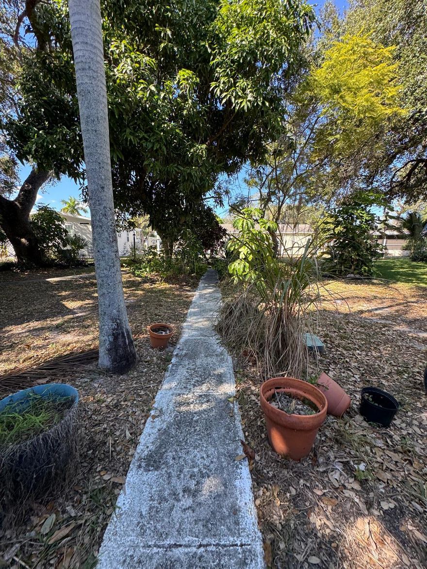 Handyman Special. Great opportunity for investors or homeowners that you can't miss.  2BR/2BA. Double wide,  located in the desirable The Meadows Florida Community, an ALL-AGE. Sold AS IS. Neighborhood offering comfort, convenience, and safety for the whole family. Perfect Location: with amazing amenities: playground, BBQ area, gym, pool, basketball court, and clubhouse -- all just steps away!. Enjoy its prime location, close to the PGA Mall, university, public transportation, and only minutes from the beach. All measurements are approximate. Call the listing agent today to schedule your showing! Don't miss the chance to live comfortably.