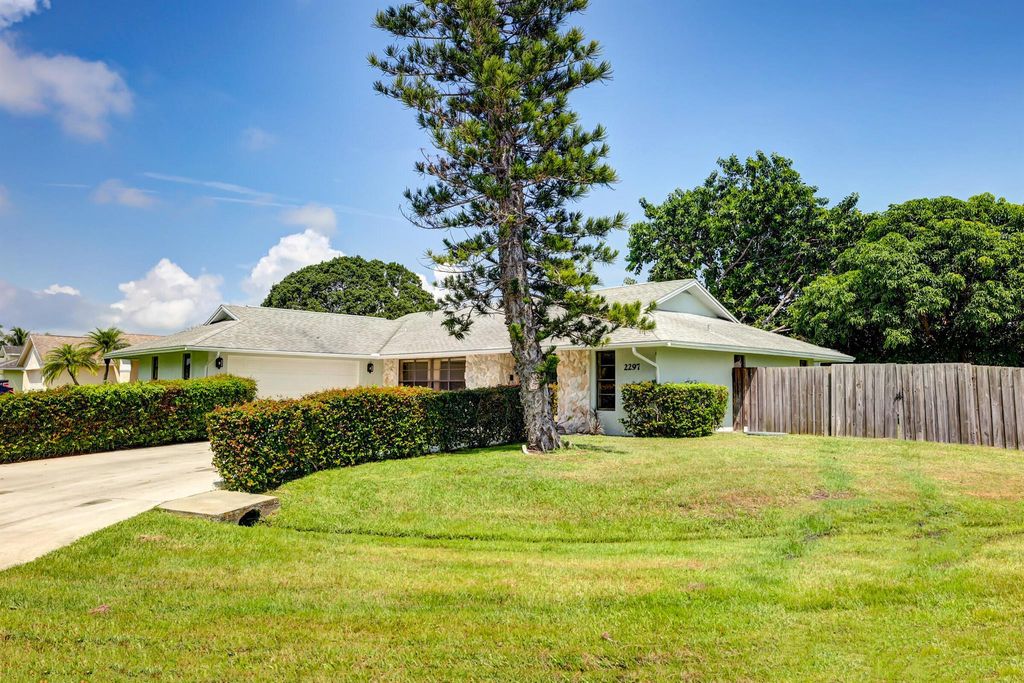 Photo of 2297 SE Trillo Street, Port St Lucie, FL 34952 (MLS # R10916626)