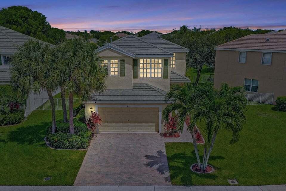 Beautiful, well maintained 3/2.5 /2 + loft in 24/7 manned gated community, sunset lakeview, corner lot, fenced, extended patio w/ privacy wall. Dramatic 2 story foyer & formal living room, volume ceilings, open & bright floor plan, kitchen w/SS appliances, breakfast bar & eat in area open to family room, formal dining room w/wet bar. Master bedroom w/ensuite bath, roman tub, separate shower, dual sinks, walk-in closet. Split bedrooms w/J&J bath, loft, and a brand new AC unit. Storm-ready w/shutters & natural gas appliances. Plank flooring/ 1st floor, brand new carpeting/ 2nd floor, window treatments, upgraded fans, pendant lights & fixtures, freshly painted. Rent includes: High speed internet, cable, monitored alarm, landscaping, sprinklers & exterior pest control.