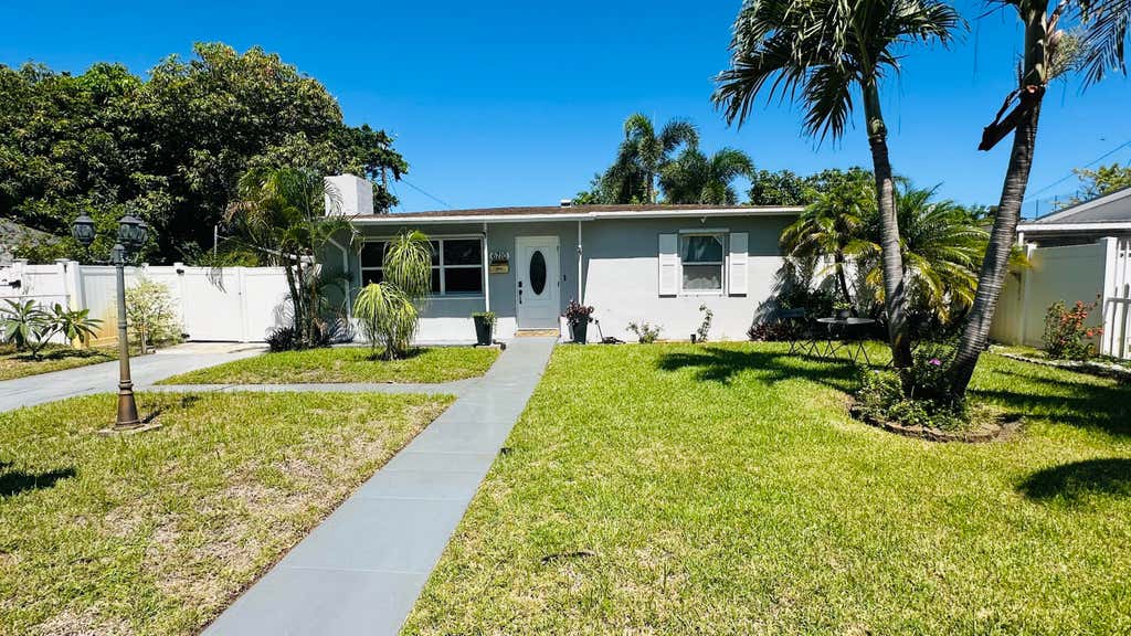 Photo of 6710 Forest Court, West Palm Beach, FL 33405 (MLS # B26061542)