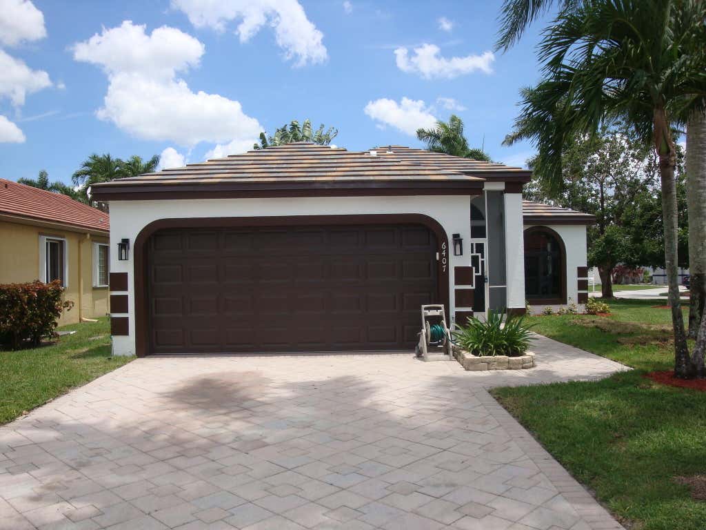 Photo of 6407 Breckenridge Circle, Lake Worth, FL 33467 (MLS # B26058546)