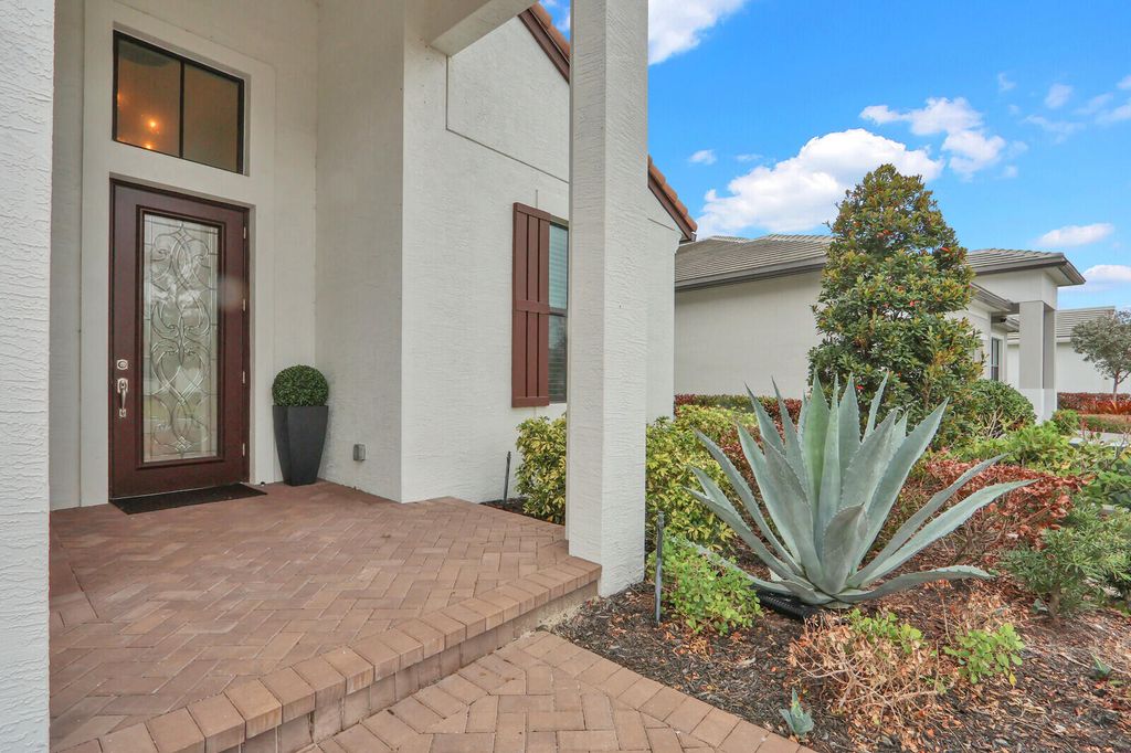 Photo of 9204 SW Arco Way, Port Saint Lucie, FL 34987 (MLS # B26008123)