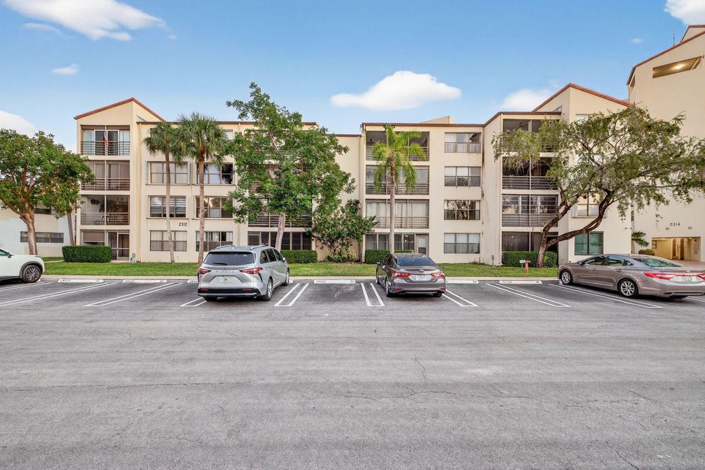 Photo of 2312 S Cypress Bend Drive #405, Pompano Beach, FL 33069 (MLS # F10544229)