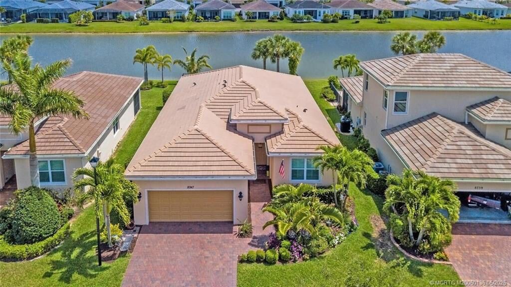 Photo of 8747 SW Vico Way, Port Saint Lucie, FL 34987 (MLS # B26032711)