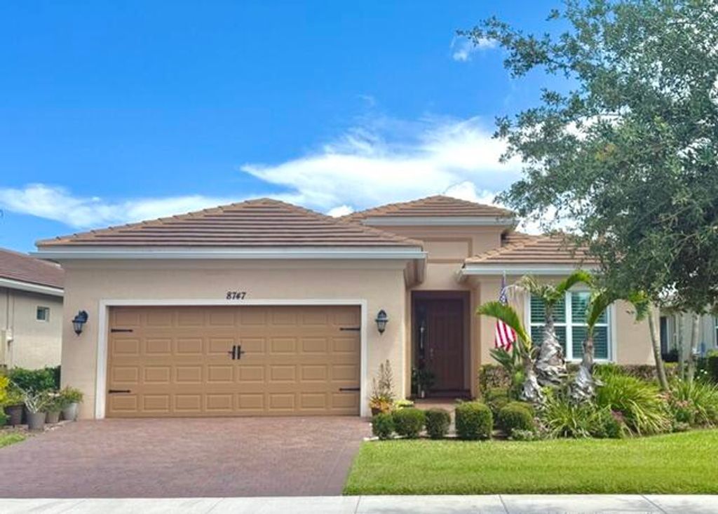 Photo of 8747 SW Vico Way, Port Saint Lucie, FL 34987 (MLS # B26032711)