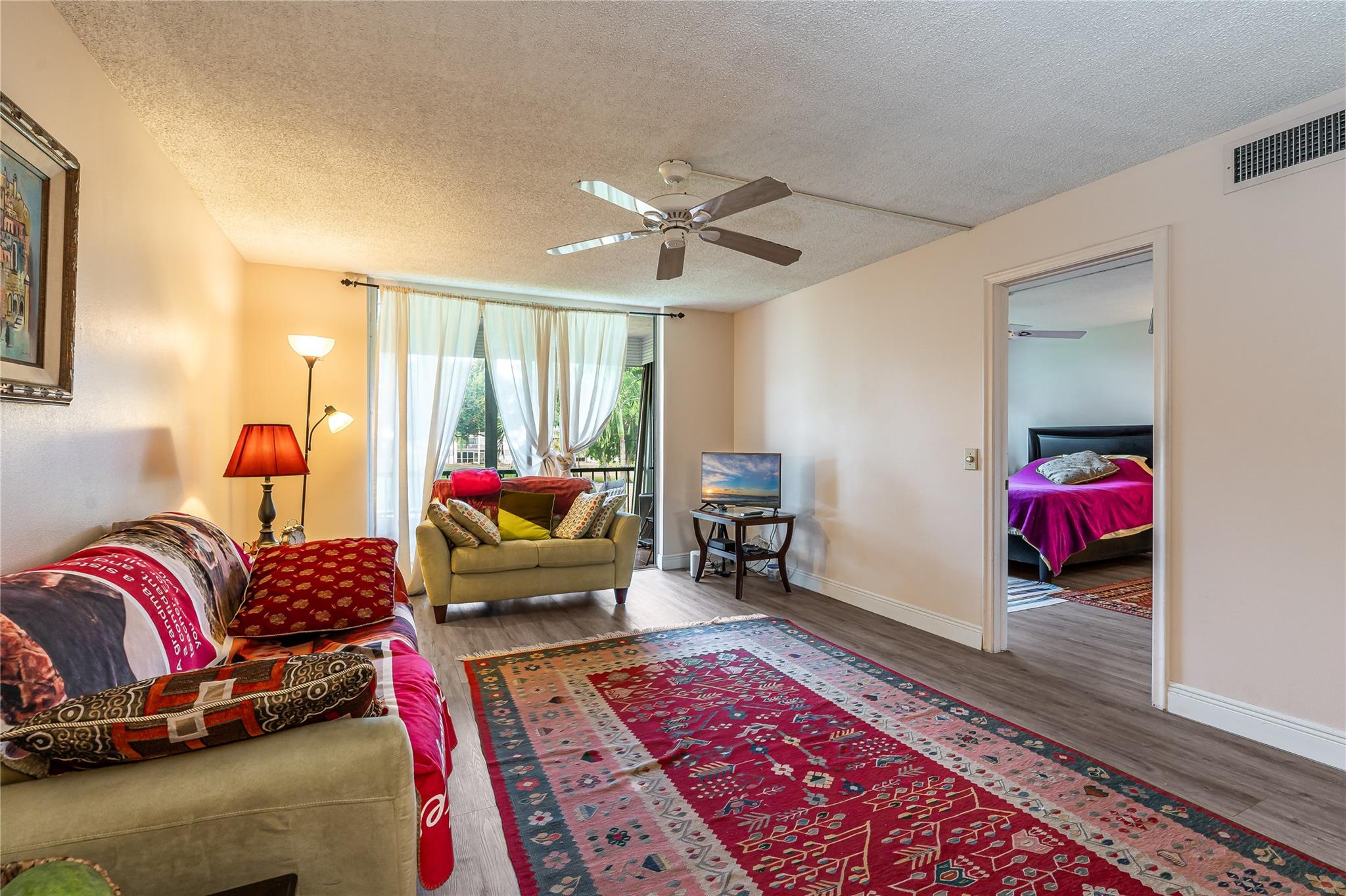 Enjoy BEAUTiFUL SUNSETS overlooking a large lake and the 7th and 18th holes on the Par 3 Golf Course. 2BR/2BA conveniently close to the B Gate. Newer bathroom vanities. Steps to pool and BBQ. Clean and move-in ready.
FREE golf (except cart fees) on two 18 hole courses (PGA & Par3); Amenities include Restaurant, Billiard Room, Bbq/Picnic Area, Clubhouse, Courtesy Bus, Exercise Room, Heated Pool, Library, Putting Green, Sauna, Shuffleboard, Tennis, Pickle Ball, Vehicle Wash Area, Electric Car Charging Station. Close to shopping, dining & highways. 15 min. to beach. Association says 55+ age required; One of Hollybrook's best views!