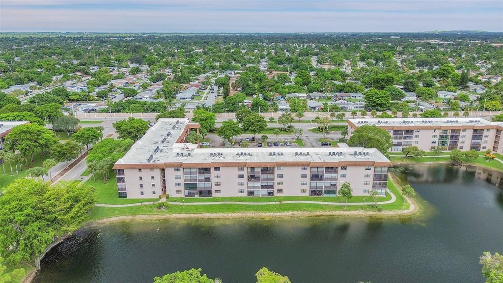 Photo of 4940 E Sabal Palm Blvd #202, Tamarac, FL 33319 (MLS # F10525597)