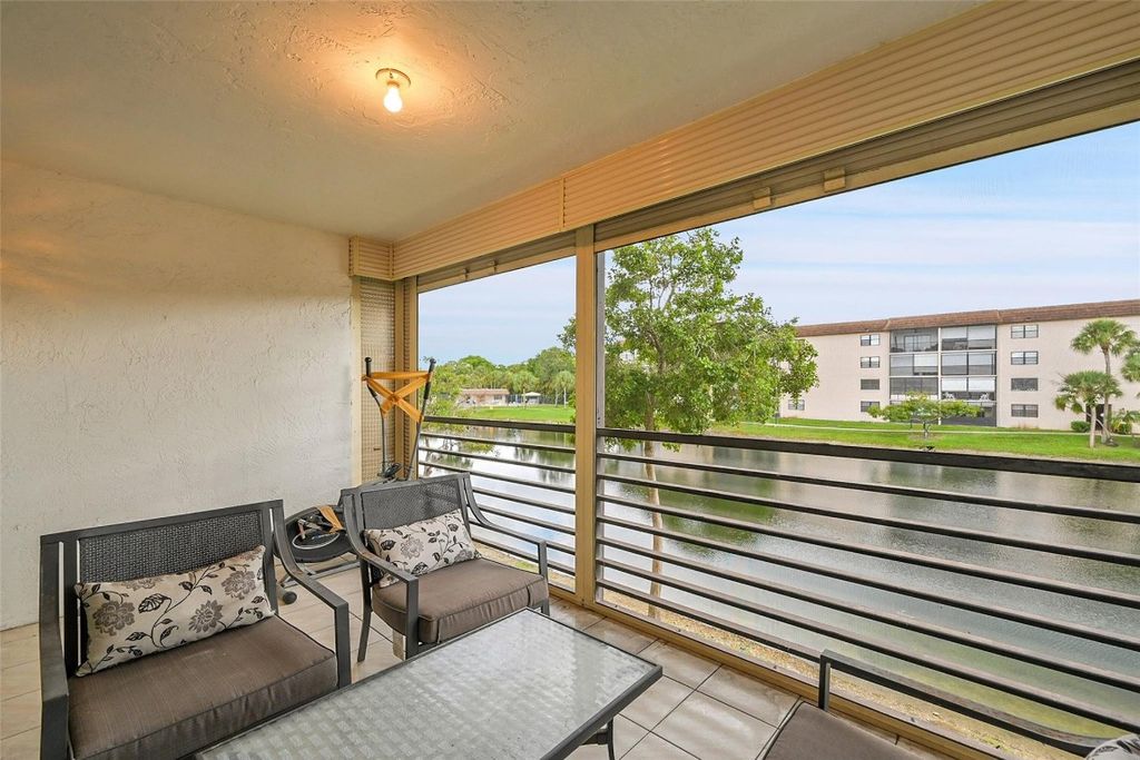 Photo of 4940 E Sabal Palm Blvd #202, Tamarac, FL 33319 (MLS # F10525597)