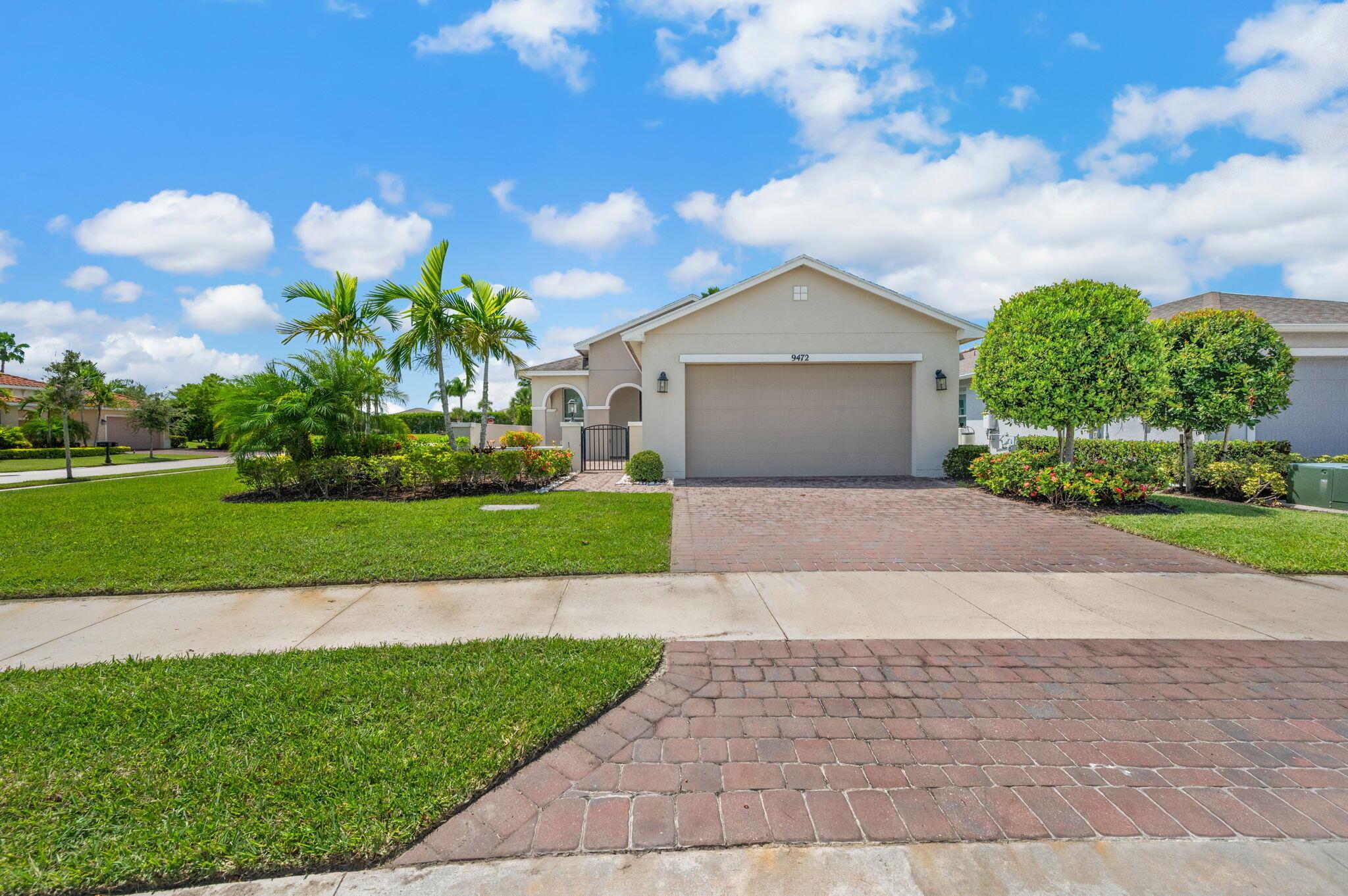 Beautiful, oversized corner lot in the Vitalia gated community of Tradition. If you are a pickleball player this is the place for you! As you enter this home you are greeted with a large open courtyard not found on many units! This home is complete with master suite including large walk in closet, dual sinks and shower. 2nd bedroom with tub bath and den/office or 3rd bedroom with double doors. Center island kitchen with 42in cabinets and granite countertops. Other features include laundry room with extra storage, impact windows and doors, 2 car garage, automatic sprinkler system and screened lanai with plenty of privacy off kitchen.Vitalia is resort style living with amenities including: