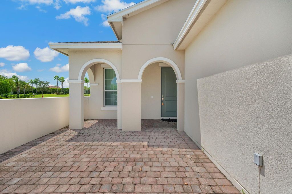 Photo of 9472 SW Royal Poinciana Drive, Port Saint Lucie, FL 34987 (MLS # R11118892)
