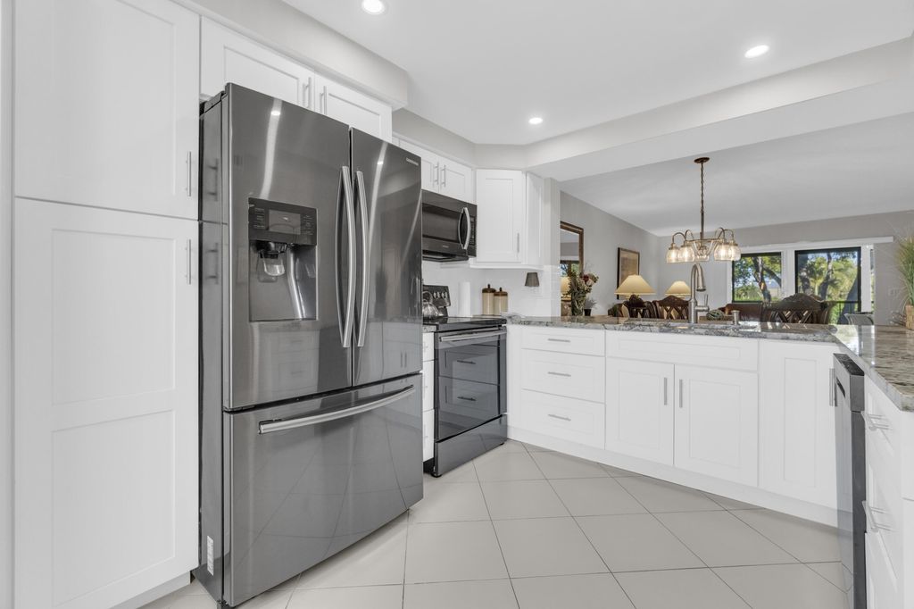 Photo of 7185 Huntington Lane #202, Delray Beach, FL 33446 (MLS # R11160847)