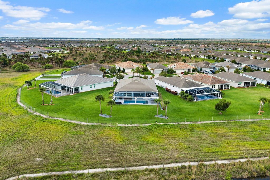 Photo of 10211 SW Pervenche Lane, Port Saint Lucie, FL 34987 (MLS # B26003480)