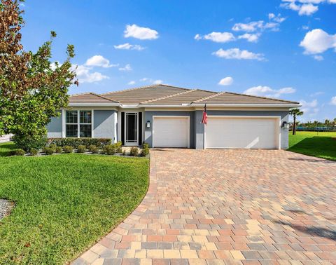 Photo of 10211 SW Pervenche Lane, Port Saint Lucie, FL 34987 (MLS # B26003480)