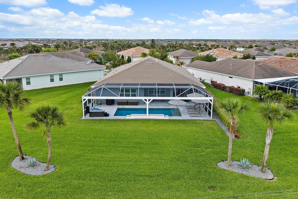 Photo of 10211 SW Pervenche Lane, Port Saint Lucie, FL 34987 (MLS # B26003480)