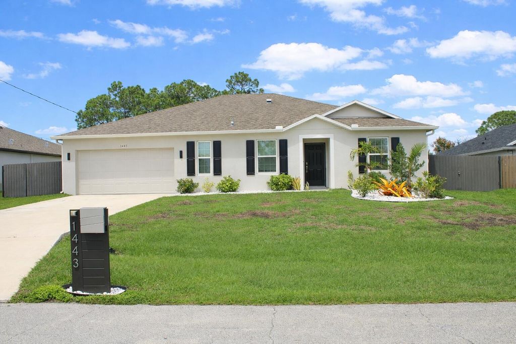 Photo of 1443 SW Gadsan Avenue, Port Saint Lucie, FL 34953 (MLS # B26012880)