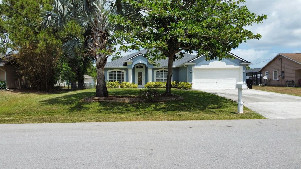 Photo of 135 SW Eyerly Avenue, Port Saint Lucie, FL 34983 (MLS # F10500109)