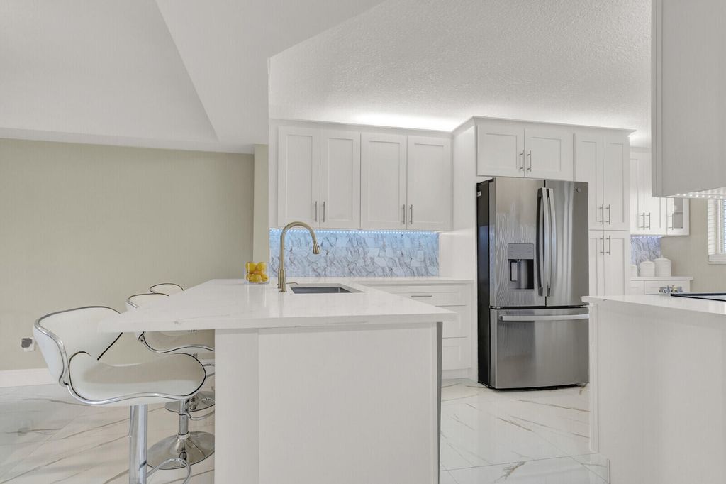 Photo of 23277 Barwood Lane N #Apt 107, Boca Raton, FL 33428 (MLS # B26006480)