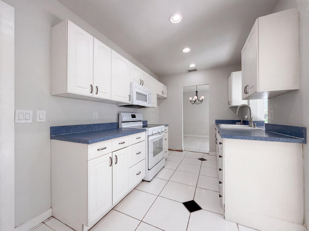 Photo of 4360 12th TER, Deerfield Beach, FL 33064 (MLS # B26066093)