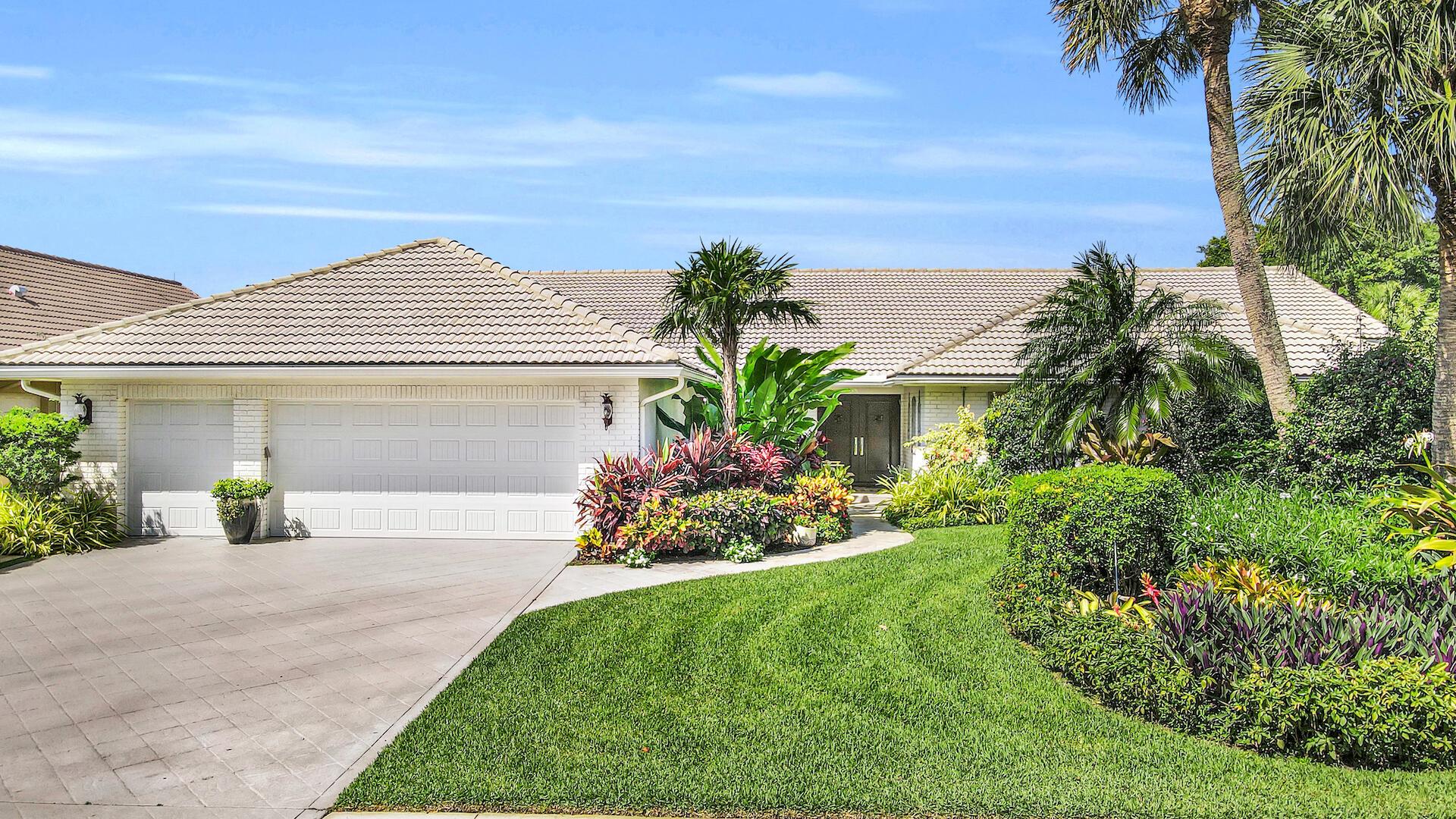 Move right in to this beautifully high-end renovated home in the desirable Bocaire Country Club! Tastefully designed in neutral tones, this 4 bedroom, 4 1/2 bath home is perfect for entertaining or quiet relaxation. The large, welcoming & open living room boasts vaulted ceilings, exquisite wet bar and leads out to large back patio. Spectacular! With a new heated pool&spa, new patio pavers, professionally designed landscaping, serene golf course views, it is a magical oasis! The designer kitchen will wow! Walk-in pantry & separate laundry room. Dining area is surrounded by floor to ceiling windows allowing views of lush bushes & flowers -brings the outside in! The primary bedroom boasts TWO bathrooms, large built-out closet, new carpeting. Impeccably maintained: All IMPACT windows/doors,