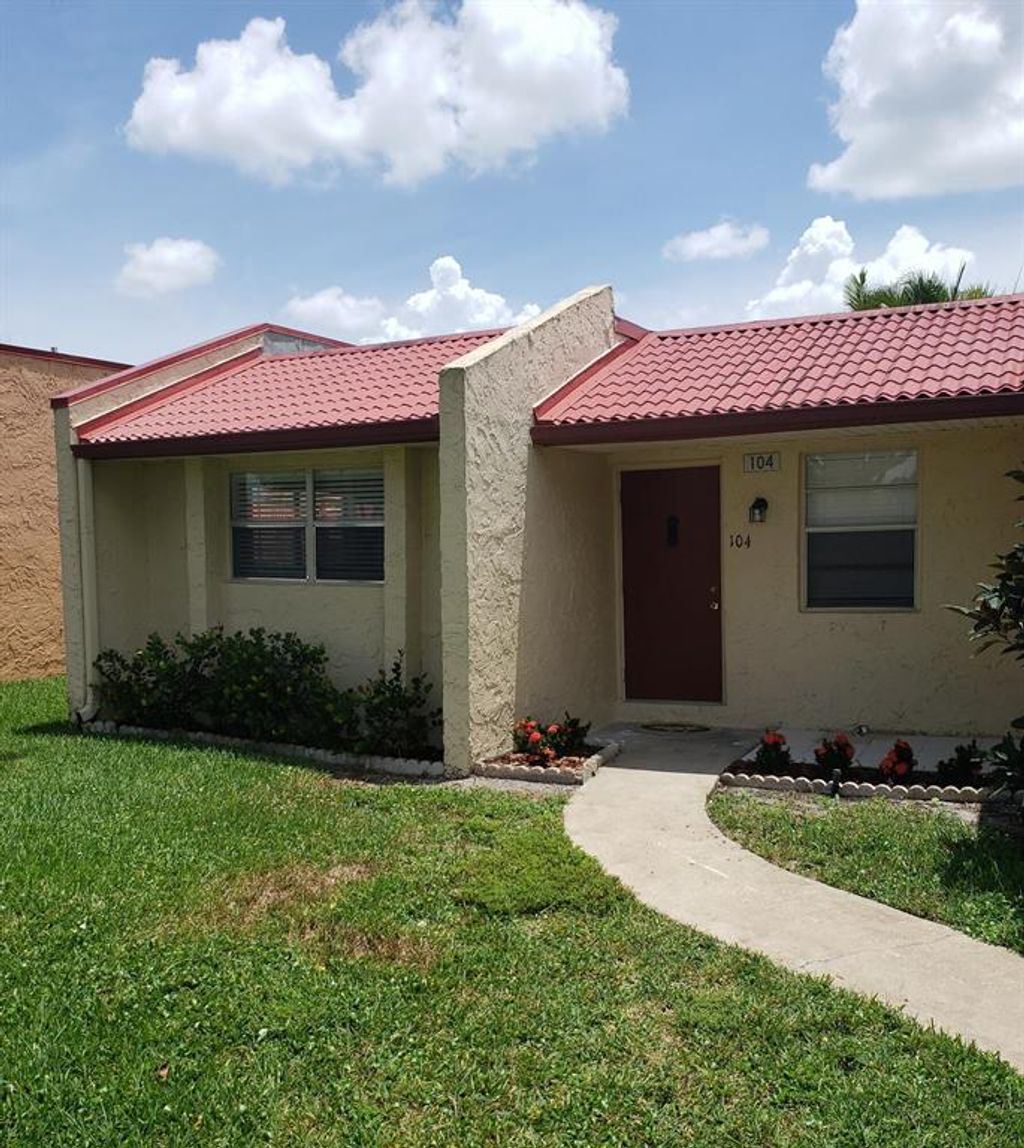 Photo of 104 Lake Irene Drive, West Palm Beach, FL 33411 (MLS # R10733268)