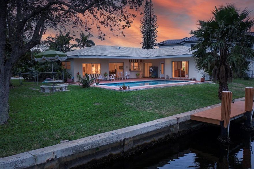 85± FT DEEPWATER | LOT: 0.246± ACRES OR 10,740± SQ FT | SHOULD ACCOMODATE A 60+ FT YACHT | CANAL 90± FT WIDE FOR WIDE BEAMS | TURNING BASIN FOR WIDE VIEWS AND EASY YACHT ENTRY | OVERSIZED SIDE YARD FOR CHILDREN OR PETS | ROOM FOR EXPANSION ON THE SIDE YARD | HOME WELL MAINTAINED THROUGH THE YEARS | READY FOR RENOVATIONS | ALL TERRAZZO FLOORS | PRIMARY BEDROOM WING WITH ADJACENT 4TH BR OR OFFICE | PRIMARY BEDROOM VIEWS WATER | 2 BEDROOMS & 2 BATHS ON SEPERATE WING | FULL CABANA BATH TO THE POOL | KITCHEN HAS PASS-THROUGH TO POOL | KITCHEN HAS ADJACENT FAMILY & MEDIA ROOM | FORMAL DINING AREA VIEWS THE POOL | TWO CAR GARAGE | QUIET NEIGHBORHOOD ONE BLOCK TO THE INTRACOASTAL | 5-MINUTES TO THE BEACH & PIER | 10-MINUTES TO PINECREST SCHOOL | 5-MINUTES TO HOLY CROSS OR IMPERIAL PT HOSPITAL