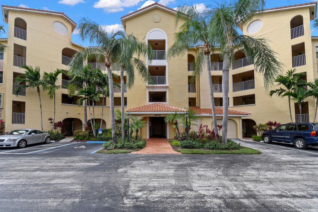 Photo of 400 Uno Lago Drive #102, Juno Beach, FL 33408 (MLS # R10905116)