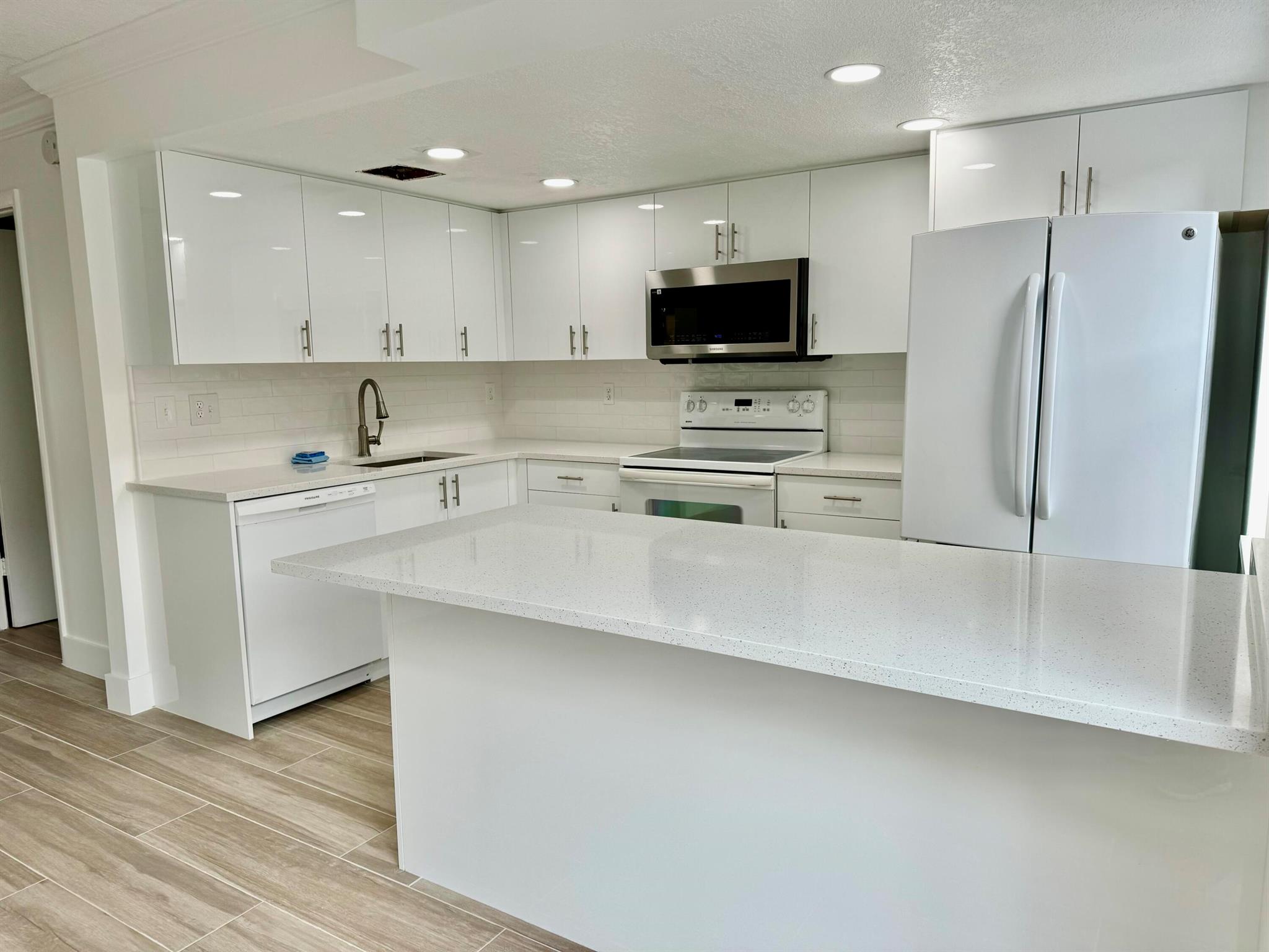 LOCATION, LOCATION, LOCATION !!! Enjoy this fully renovated 3 bedroom 2 1/2 baths townhome in the heart of Palm Beach Gardens. The location could not be more convenient, close to I95, The Beach, Shops, Restaurants and much more. The brand new kitchen with Quartz Counter Tops is a dream. All 3 bedrooms are on the 2nd floor and 2 full baths. The 1/2 bath and Laundry Room are on the 1st floor. You will enjoy the extra Large Living Space, 2 dining room areas on the first floor and a Fenced-in Outdoor Patio with Storage Room. COME SEE IT TODAY! Tenant Occupied.
