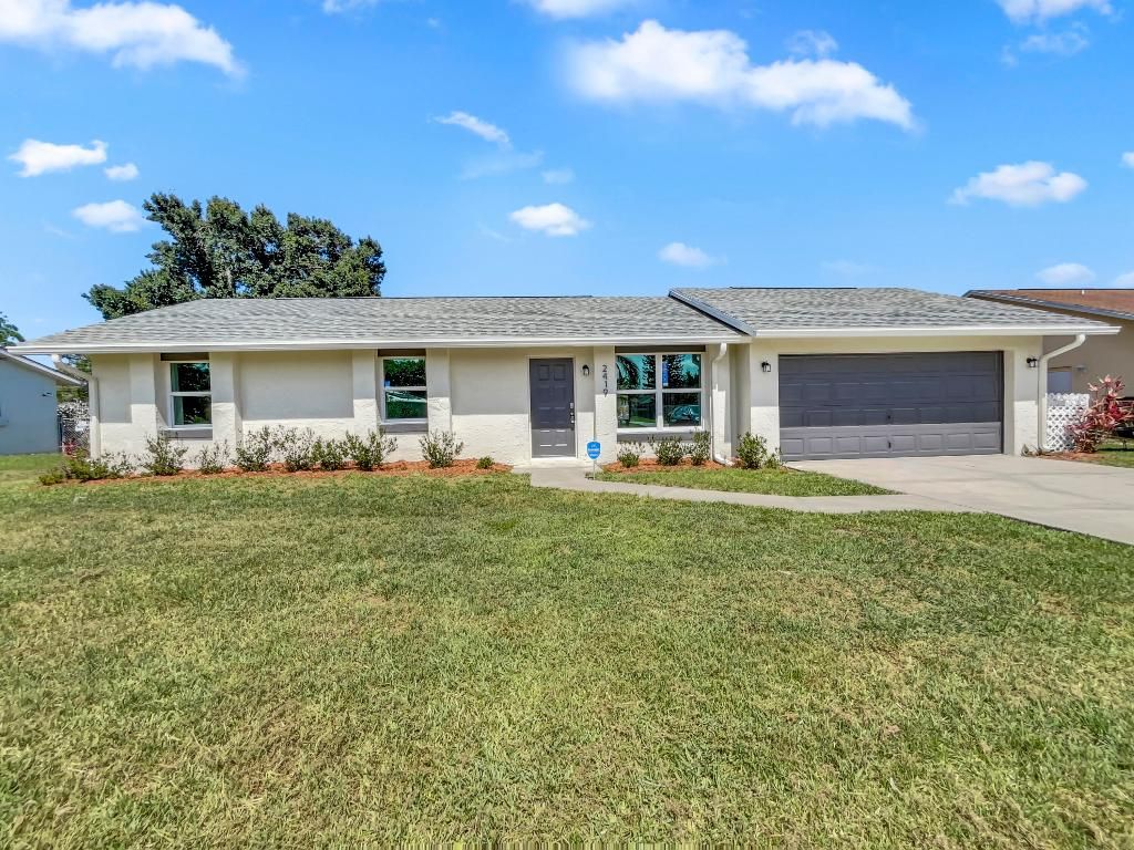 Photo of 2419 SE Marseille Street, Port Saint Lucie, FL 34952 (MLS # R10990507)