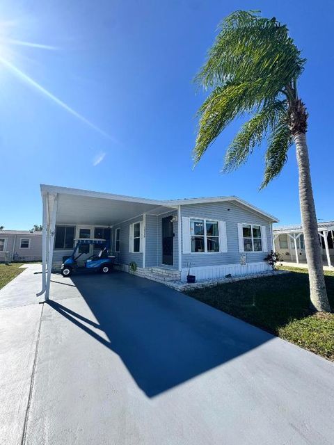 Photo of 13953 Adelfa Avenue, Fort Pierce, FL 34951 (MLS # R11158436)