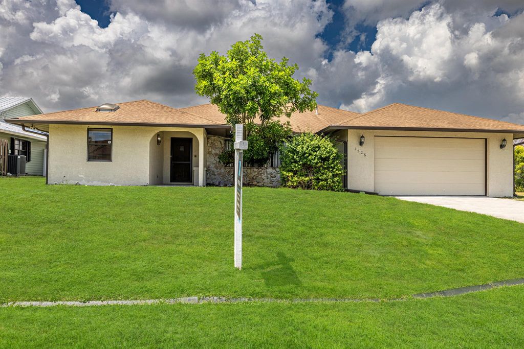 Photo of 1526 SE Cownie Street, Port St Lucie, FL 34983 (MLS # R10906251)