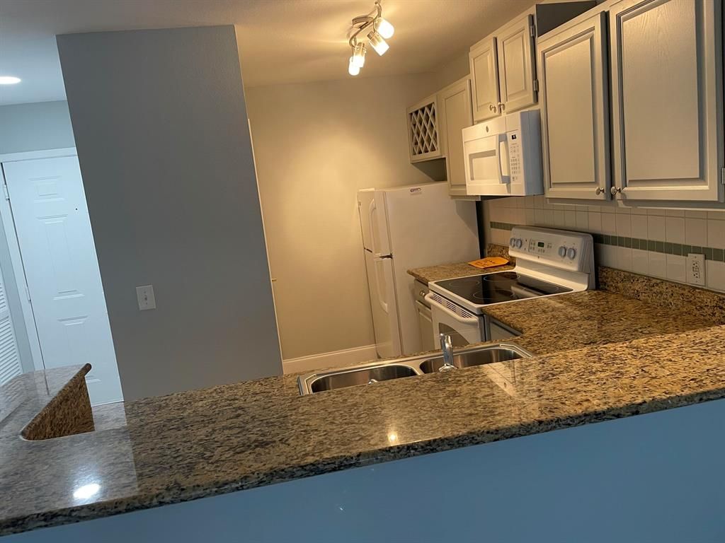 Photo of 1705 Palm Cove Boulevard #108, Delray Beach, FL 33445 (MLS # R10872873)