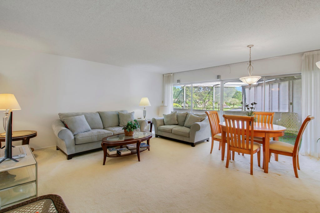 Photo of 7 GREENWAY Village N #203, Royal Palm Beach, FL 33411 (MLS # B26094893)