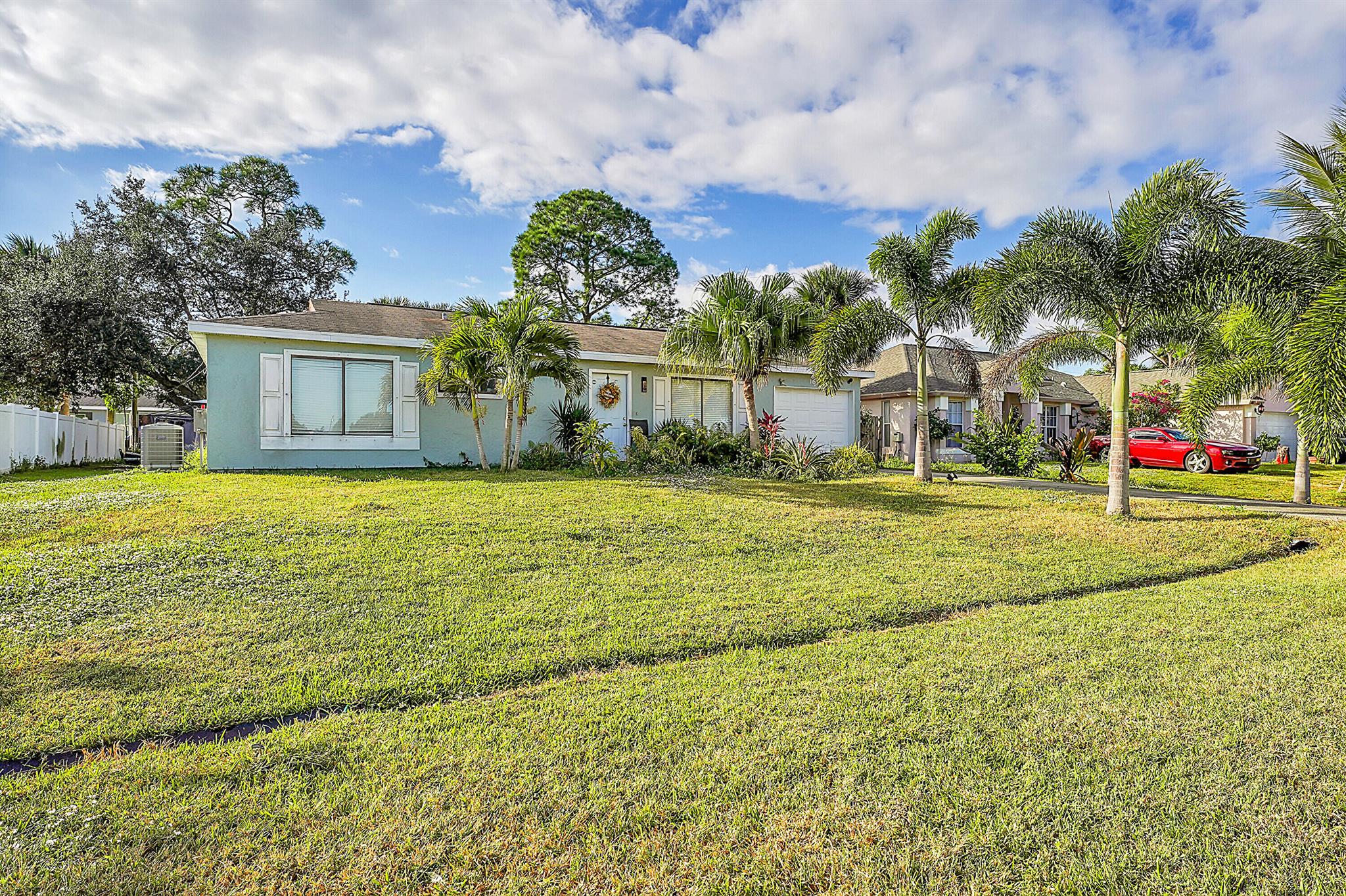 BRAND NEW ROOF INSTALLED MARCH 2025 !This beautifully remodeled home in Port Saint Lucie ,Florida offers 2 spacious bedrooms and 1.5 bath. Featuring an open floor plan, the home boast modern finishes throughout, making it ideal for those seeking both comfort and style. The property includes a large backyard , perfect for outdoor activities or relaxation, along with a long driveway and a one -car garage for added convenience. It offers a almost new AC unit only 2 years old, with brand new roof. This home provides excellent value and peace of mind for its new owners. Whether you're a first- time homebuyer or looking for a great investment this home is an outstanding choice. call today and make it your home