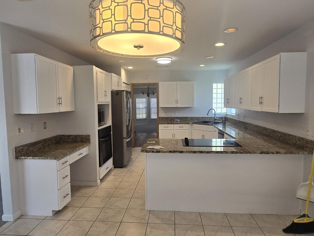 Photo of 2482 NW 25th Street, Boca Raton, FL 33431 (MLS # R11082192)