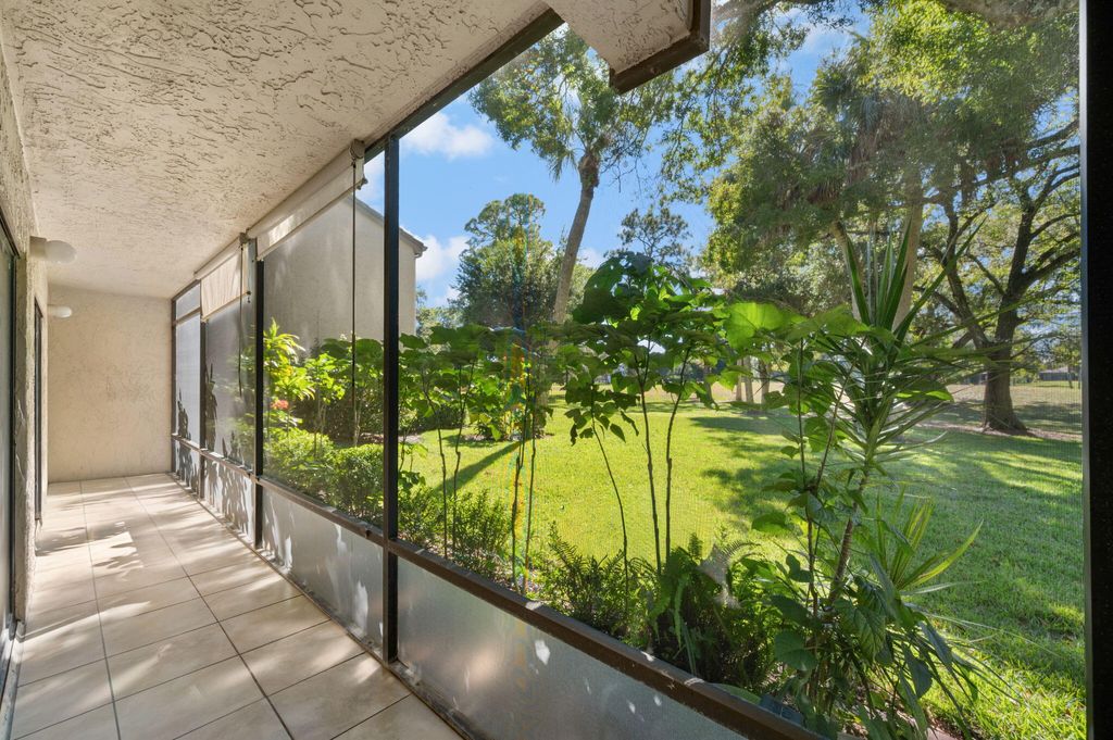 Photo of 9460 Meadowood Drive #103, Fort Pierce, FL 34951 (MLS # R11141008)