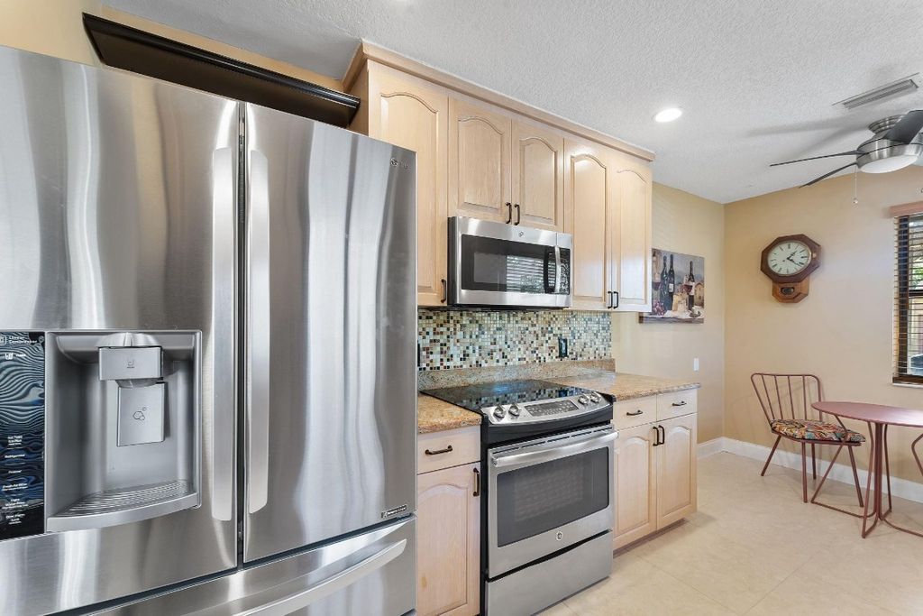 Photo of 4485 Cordia Circle, Coconut Creek, FL 33066 (MLS # F10542811)