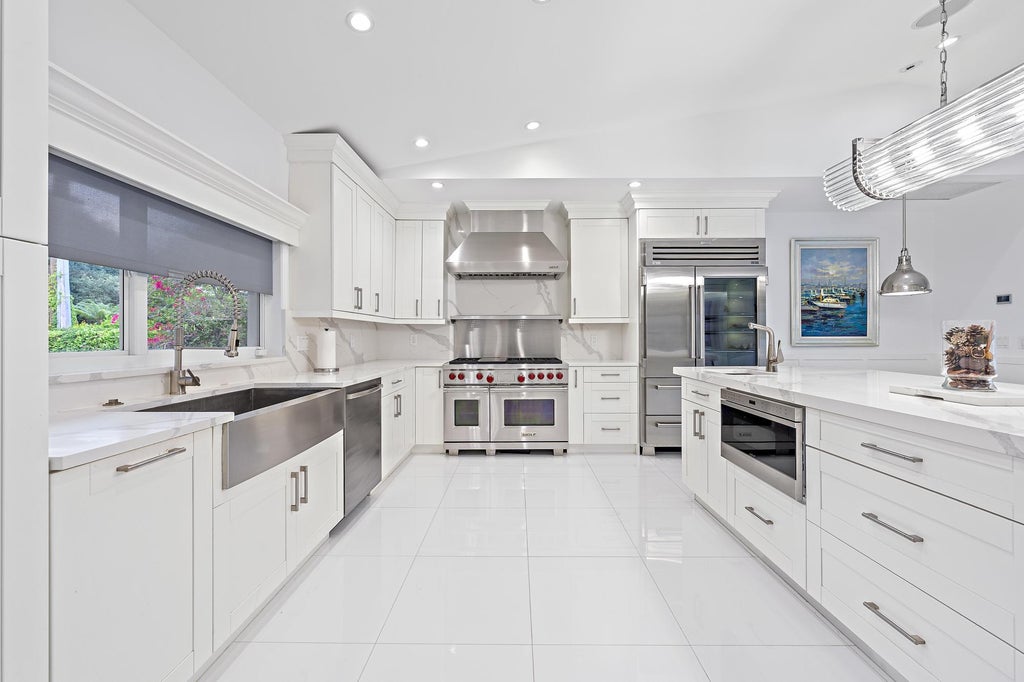Photo of 11360 W Teach Road, Palm Beach Gardens, FL 33410 (MLS # B26043230)