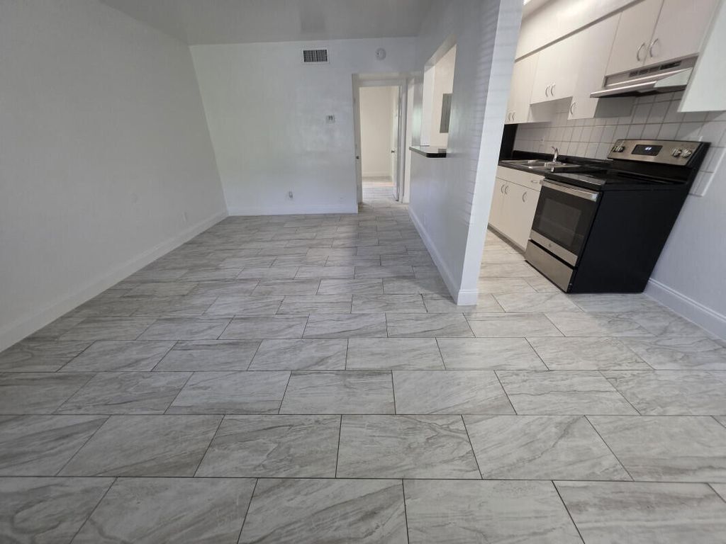 Photo of 100 SW 9th Street #103, Fort Lauderdale, FL 33315 (MLS # B26024328)
