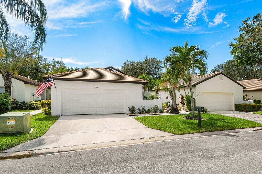 Photo of 65 Ironwood Way N, Palm Beach Gardens, FL 33418 (MLS # R11024000)