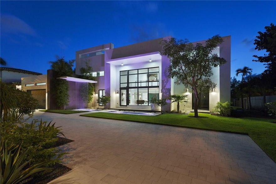 A vision of modern elegance, this inspired new showplace on Lake Mayan overlooks the lake’s serene natural oasis, just steps from ocean beach access. View-filled glass walls brighten the airy open interiors featuring wide-plank French oak floors, a linear fireplace and sleek Italian-crafted kitchen. Fabulous resort-style outdoor entertaining areas include a 52±-ft. infinity pool and dramatic roof deck with fire-pit. Exquisite furnishings also available. Ocean-access dock for boating and fishing.