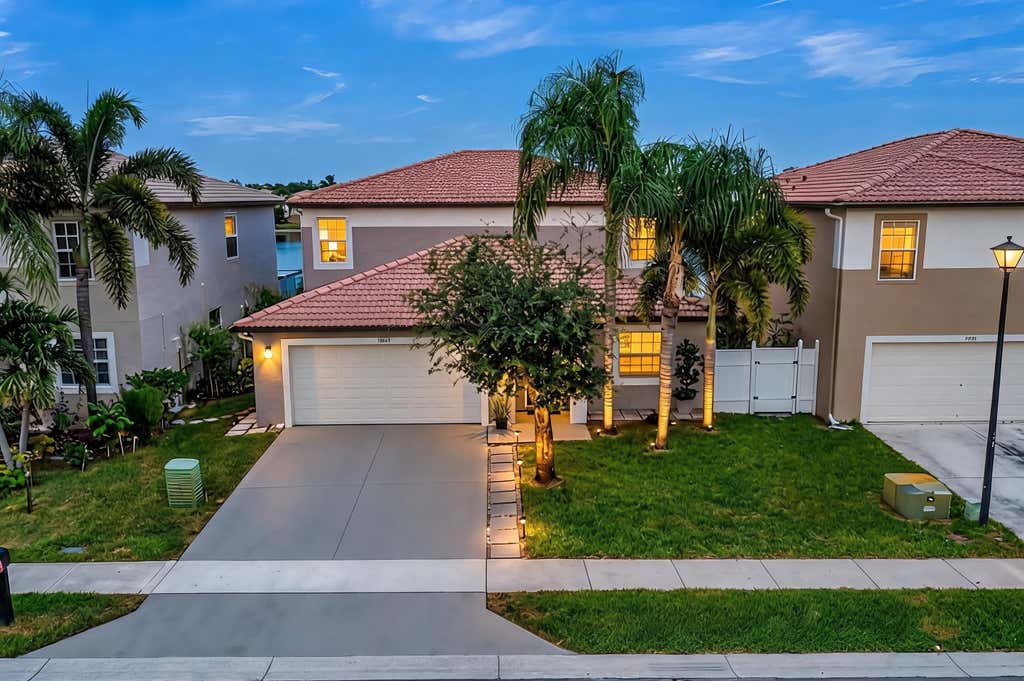 Photo of 6642 Rainwood Cove Lane, Lake Worth, FL 33463 (MLS # B26067231)