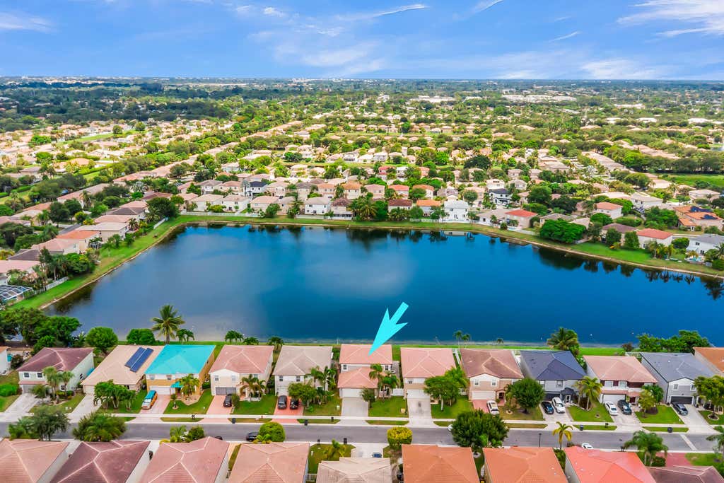 Photo of 6642 Rainwood Cove Lane, Lake Worth, FL 33463 (MLS # B26067231)