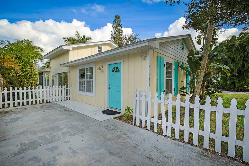 Photo of 1017 SW Spruce Street, Palm City, FL 34990 (MLS # R11144443)