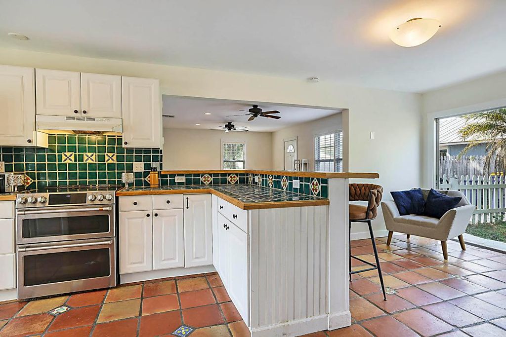 Photo of 1017 SW Spruce Street, Palm City, FL 34990 (MLS # R11144443)